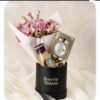 Cajita negra con flores y chocolates